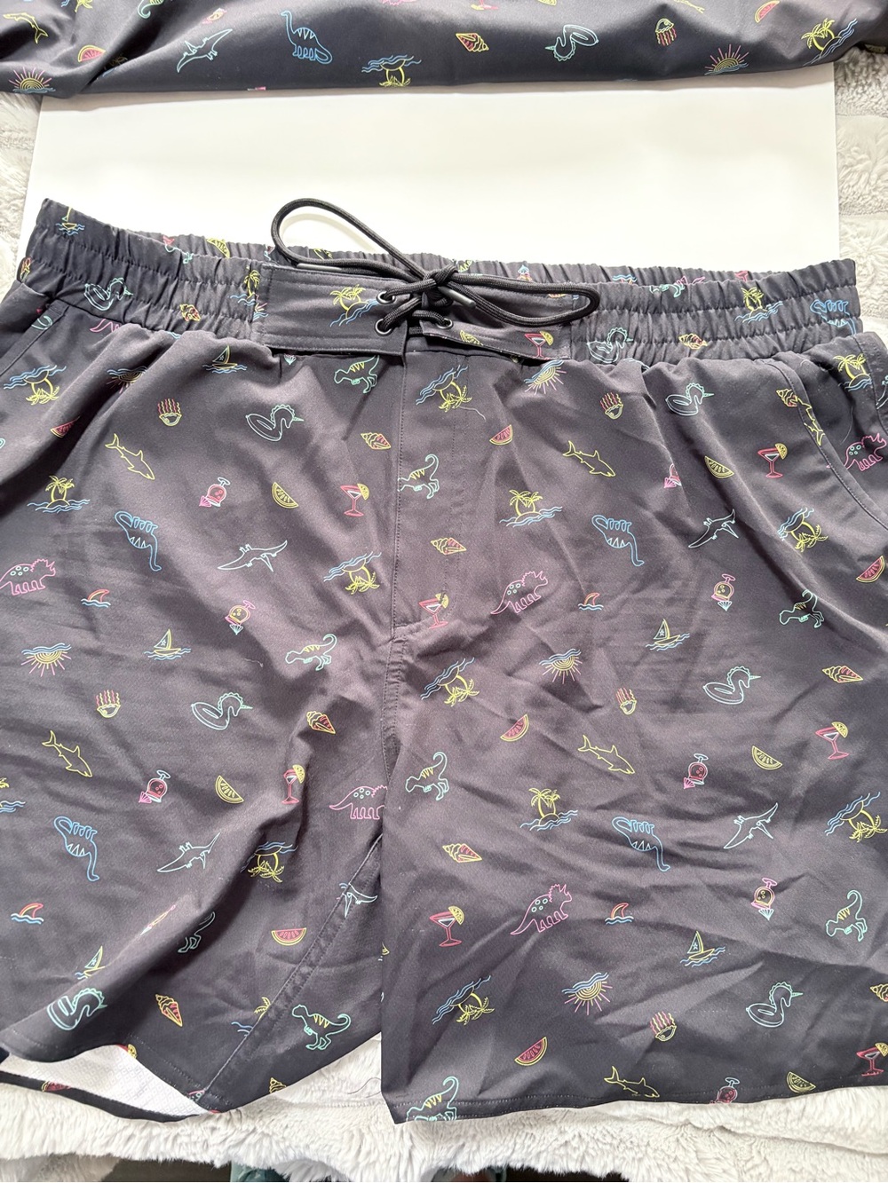 Tomboyx 3x Black Swim Trunks with Neon Beach Print design